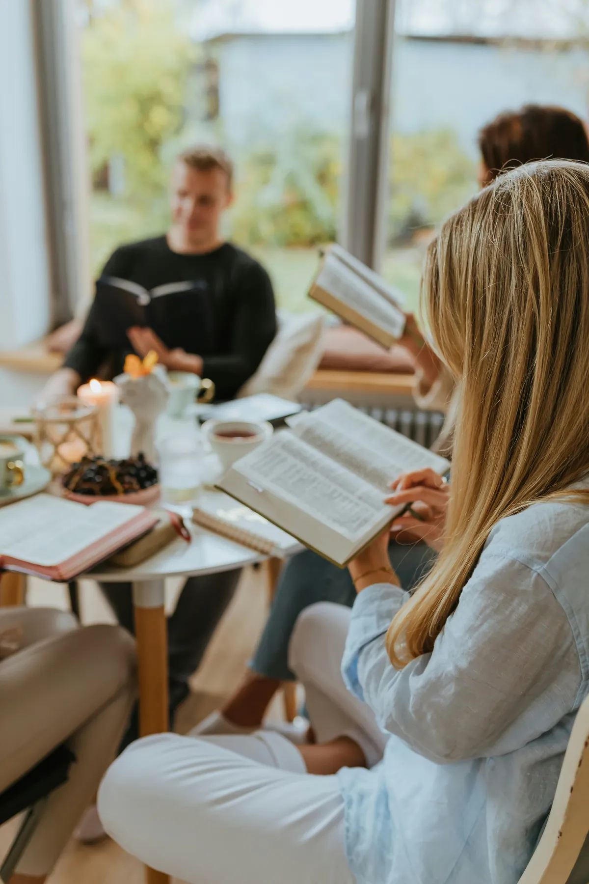A lifegroup meeting around a table at home